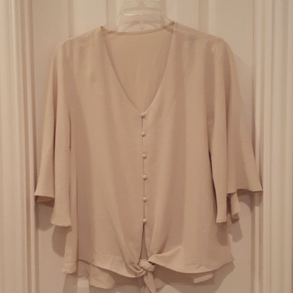 Bundle any 3 items for $20****  Woman's XL Cream Loose fitting blouse